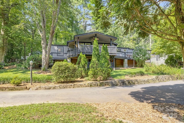 19 Timbers Edge Ln, Fairview, NC 28730 - view of front of property featuring a deck and view of wooded area