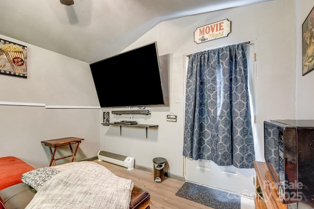 19 Timbers Edge Ln, Fairview, NC 28730 - living room with wood finished floors, vaulted ceiling, and ceiling fan