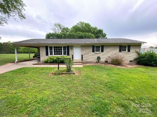 104 Edison St, Kings Mountain, NC 28086 - ranch-style house with crawl space, driveway, brick siding, a carport, and a front yard
