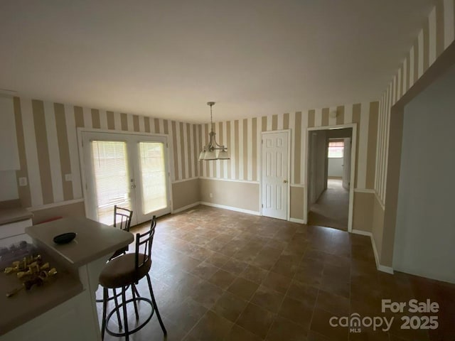 104 Edison St, Kings Mountain, NC 28086 - dining space featuring wallpapered walls, healthy amount of natural light, and french doors