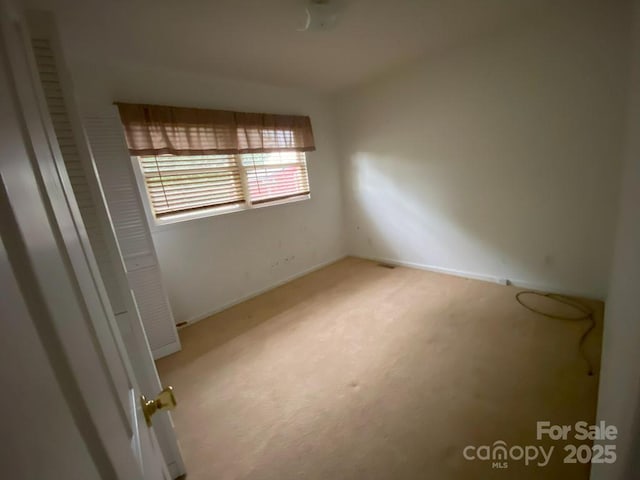 104 Edison St, Kings Mountain, NC 28086 - spare room featuring light colored carpet and baseboards