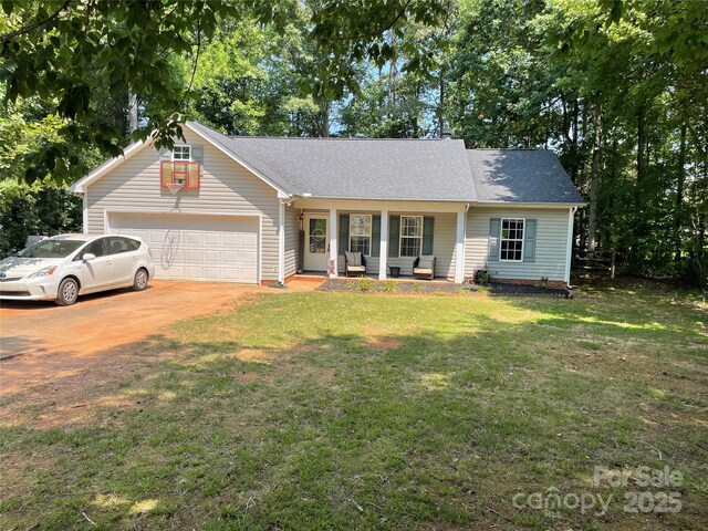 2108 Gambrel Way, Monroe, NC 28112 - view of front of property with an attached garage, a porch, a front yard, concrete driveway, and roof with shingles
