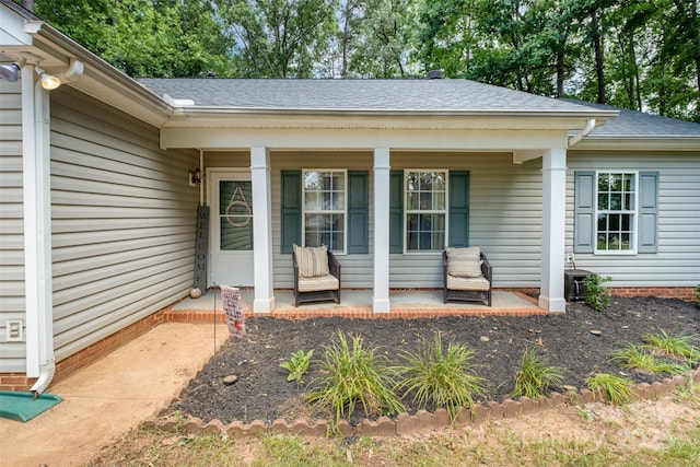 2108 Gambrel Way, Monroe, NC 28112 - property entrance with a porch and roof with shingles