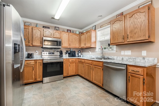 2108 Gambrel Way, Monroe, NC 28112 - kitchen with appliances with stainless steel finishes, light countertops, crown molding, and stone finish floors