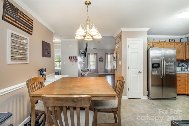 2108 Gambrel Way, Monroe, NC 28112 - dining room with a chandelier and ornamental molding