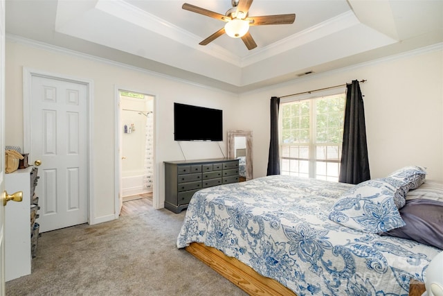 2108 Gambrel Way, Monroe, NC 28112 - carpeted bedroom featuring a raised ceiling, crown molding, ceiling fan, and connected bathroom