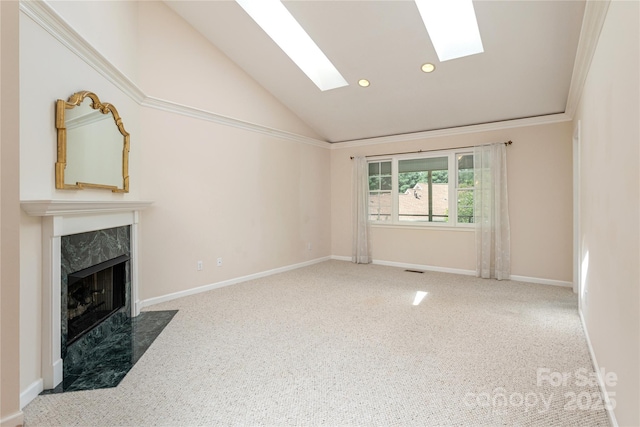 1105 Citation Cir, Hendersonville, NC 28739 - unfurnished living room with carpet flooring, a skylight, a high end fireplace, lofted ceiling, and recessed lighting