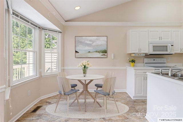 1105 Citation Cir, Hendersonville, NC 28739 - dining room featuring vaulted ceiling, recessed lighting, and crown molding