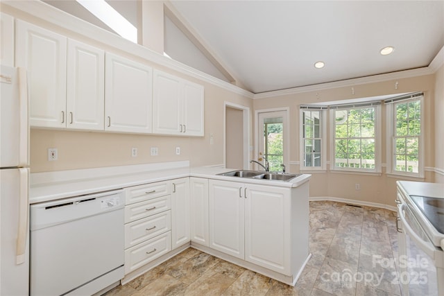 1105 Citation Cir, Hendersonville, NC 28739 - kitchen with white appliances, a peninsula, white cabinetry, recessed lighting, and light countertops