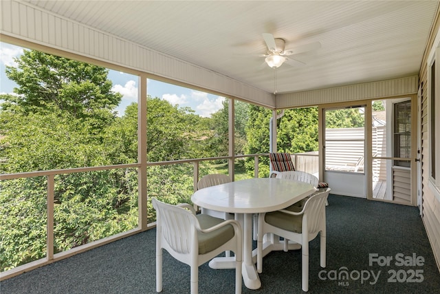 1105 Citation Cir, Hendersonville, NC 28739 - sunroom / solarium featuring a ceiling fan and outdoor dining space