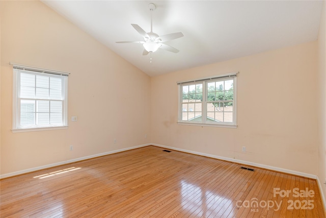 1105 Citation Cir, Hendersonville, NC 28739 - empty room with vaulted ceiling, light wood-style floors, and ceiling fan