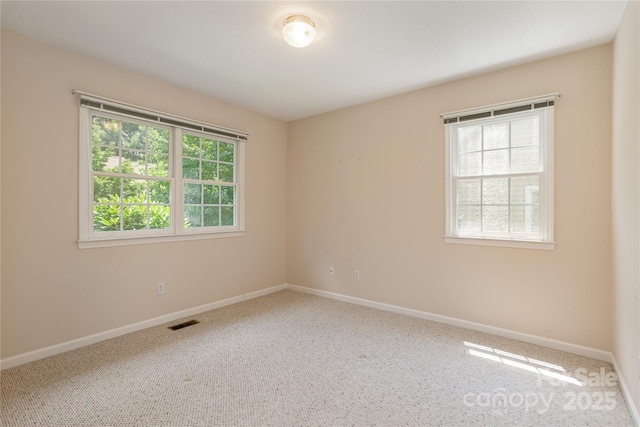 1105 Citation Cir, Hendersonville, NC 28739 - carpeted empty room featuring baseboards