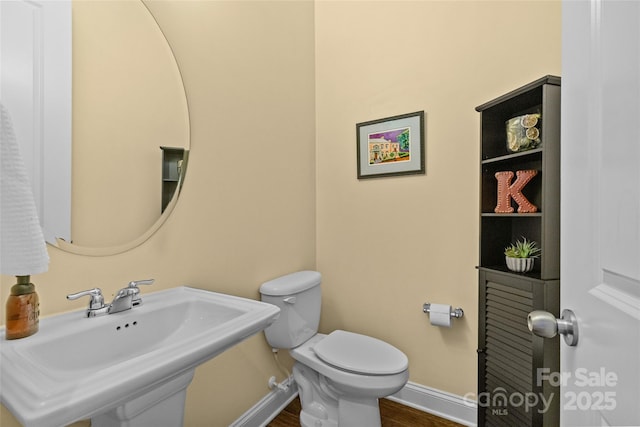 4928 Providence Country Club Dr, Charlotte, NC 28277 - bathroom featuring a sink and wood finished floors
