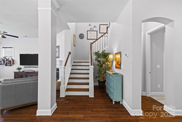4928 Providence Country Club Dr, Charlotte, NC 28277 - staircase with ceiling fan, arched walkways, and wood finished floors