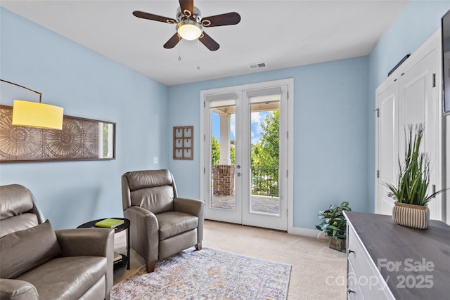 4928 Providence Country Club Dr, Charlotte, NC 28277 - sitting room with light colored carpet, a ceiling fan, and french doors