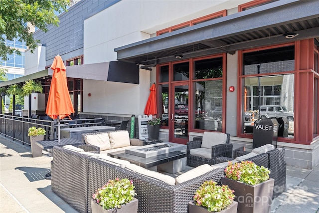 4928 Providence Country Club Dr, Charlotte, NC 28277 - view of patio featuring an outdoor living space with a fire pit