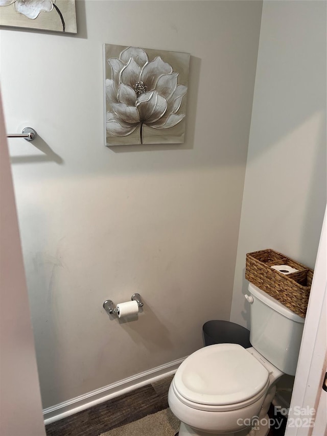 1076 Tangle Ridge Dr SE, Concord, NC 28025 - bathroom with toilet and wood finished floors