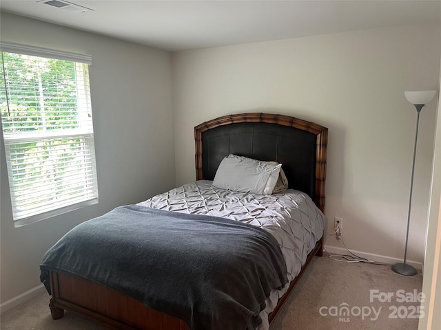 1076 Tangle Ridge Dr SE, Concord, NC 28025 - carpeted bedroom with baseboards