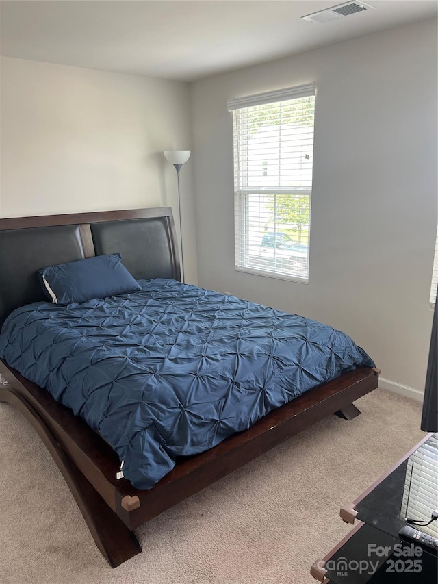 1076 Tangle Ridge Dr SE, Concord, NC 28025 - bedroom with carpet flooring and baseboards