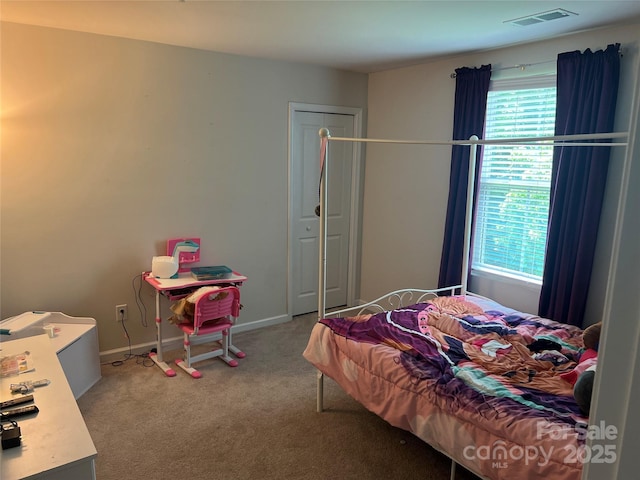 1076 Tangle Ridge Dr SE, Concord, NC 28025 - carpeted bedroom featuring baseboards