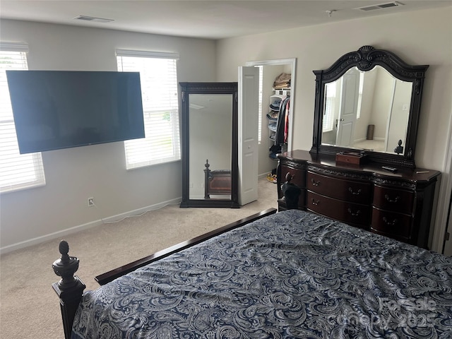 1076 Tangle Ridge Dr SE, Concord, NC 28025 - carpeted bedroom with a spacious closet and a closet