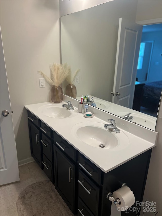 1076 Tangle Ridge Dr SE, Concord, NC 28025 - full bathroom with double vanity and tile patterned floors