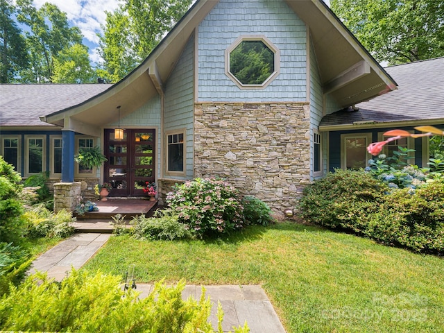 935 Whites Lake Blvd, Saluda, NC 28773 - back of house with stone siding, a yard, french doors, and a shingled roof