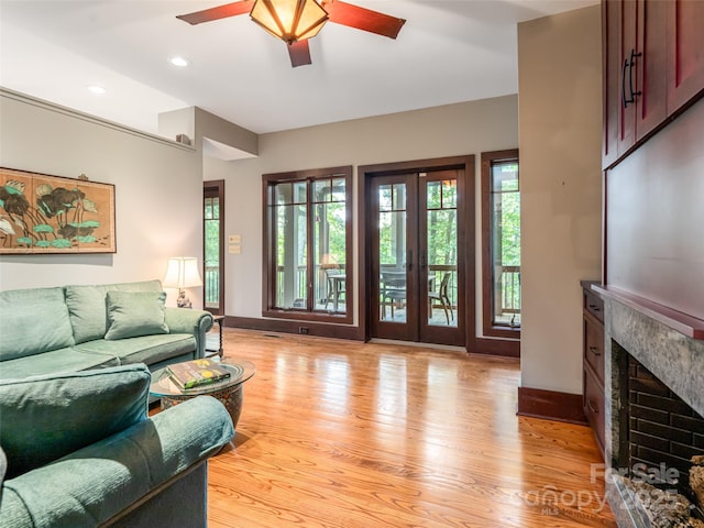 935 Whites Lake Blvd, Saluda, NC 28773 - living area with a ceiling fan, light wood-style flooring, a fireplace, and recessed lighting