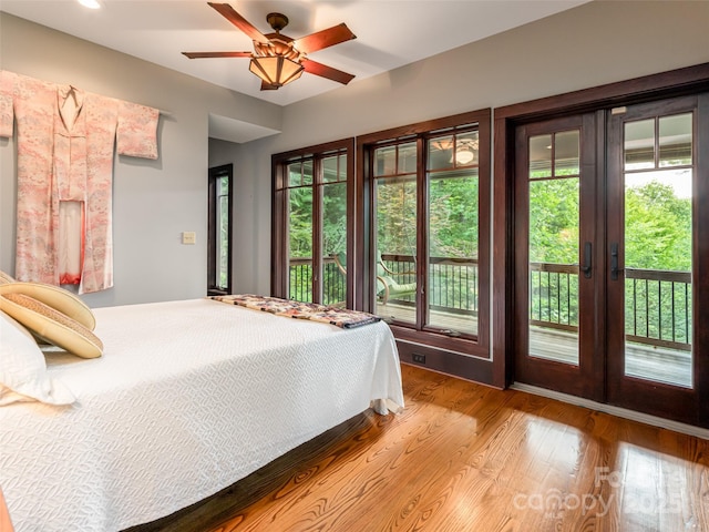 935 Whites Lake Blvd, Saluda, NC 28773 - bedroom featuring access to outside and wood finished floors