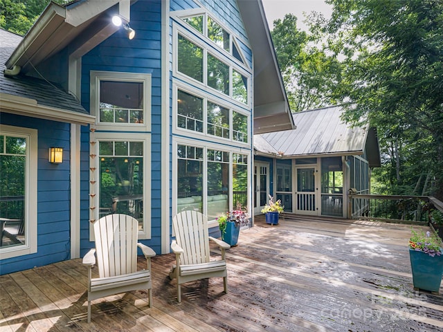 935 Whites Lake Blvd, Saluda, NC 28773 - wooden terrace featuring a sunroom