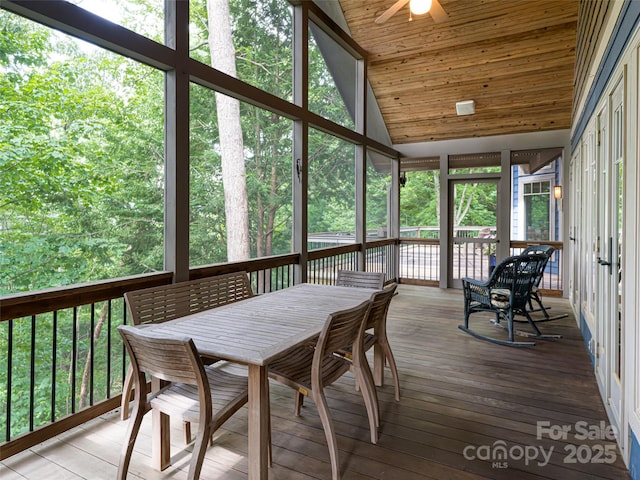 935 Whites Lake Blvd, Saluda, NC 28773 - sunroom / solarium with lofted ceiling, ceiling fan, and outdoor dining area