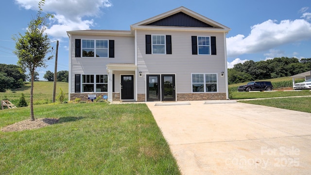 12 Wildbrook Dr, Waynesville, NC 28785 - view of front of property featuring stone siding and a front lawn