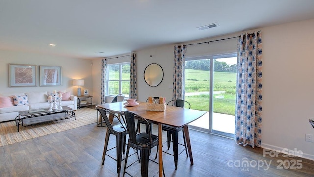 12 Wildbrook Dr, Waynesville, NC 28785 - dining area with wood finished floors and recessed lighting