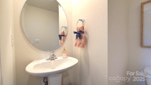 12 Wildbrook Dr, Waynesville, NC 28785 - half bath with a sink and toilet