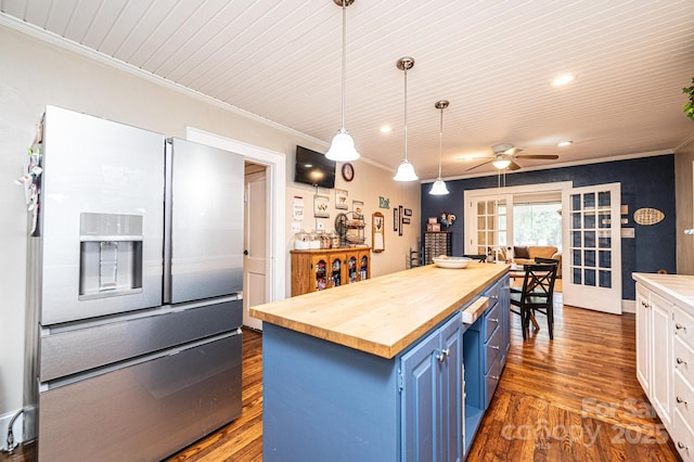 2035 Kool Park Rd NE, Hickory, NC 28601 - kitchen with stainless steel fridge, butcher block counters, blue cabinetry, crown molding, and dark wood-style floors
