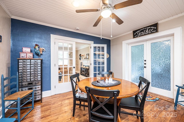 2035 Kool Park Rd NE, Hickory, NC 28601 - dining area with french doors, ornamental molding, hardwood / wood-style flooring, ceiling fan, and wood ceiling