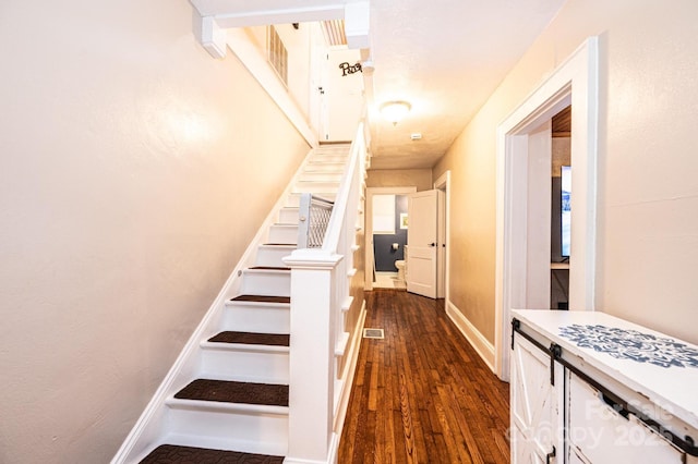 2035 Kool Park Rd NE, Hickory, NC 28601 - stairway with hardwood / wood-style floors and baseboards