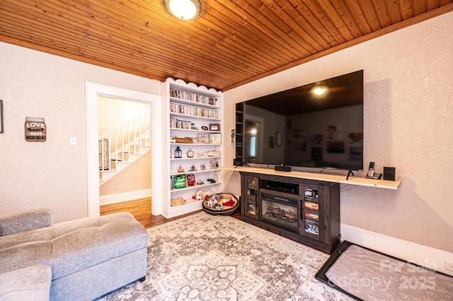 2035 Kool Park Rd NE, Hickory, NC 28601 - living area featuring a textured wall, wood ceiling, stairway, built in shelves, and wood finished floors
