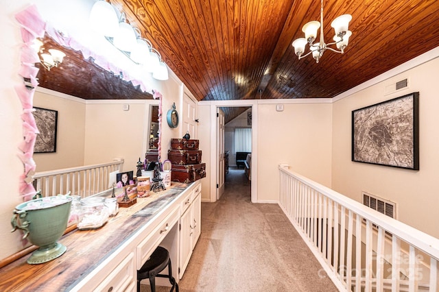 2035 Kool Park Rd NE, Hickory, NC 28601 - hallway featuring wooden ceiling, a chandelier, and light colored carpet