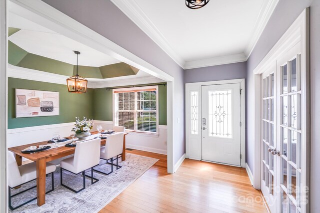4525 Chestwood Ct, Rock Hill, SC 29732 - foyer entrance with crown molding, light wood-type flooring, and a chandelier