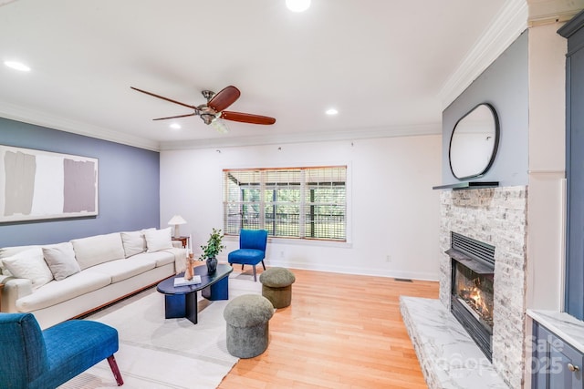 4525 Chestwood Ct, Rock Hill, SC 29732 - living area featuring crown molding, light wood finished floors, a fireplace, a ceiling fan, and recessed lighting