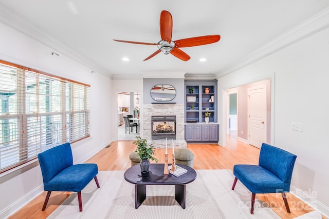 4525 Chestwood Ct, Rock Hill, SC 29732 - living room featuring ornamental molding, a ceiling fan, light wood-type flooring, a multi sided fireplace, and recessed lighting