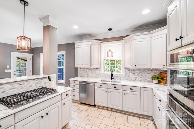 4525 Chestwood Ct, Rock Hill, SC 29732 - kitchen featuring stainless steel appliances, decorative backsplash, ornamental molding, white cabinets, and recessed lighting