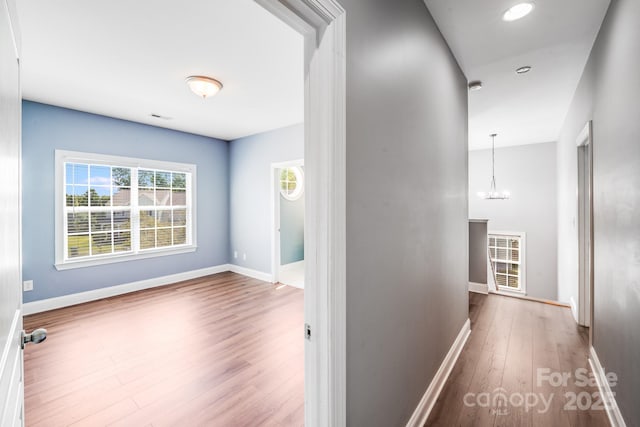 4525 Chestwood Ct, Rock Hill, SC 29732 - hallway featuring wood finished floors, a chandelier, and recessed lighting