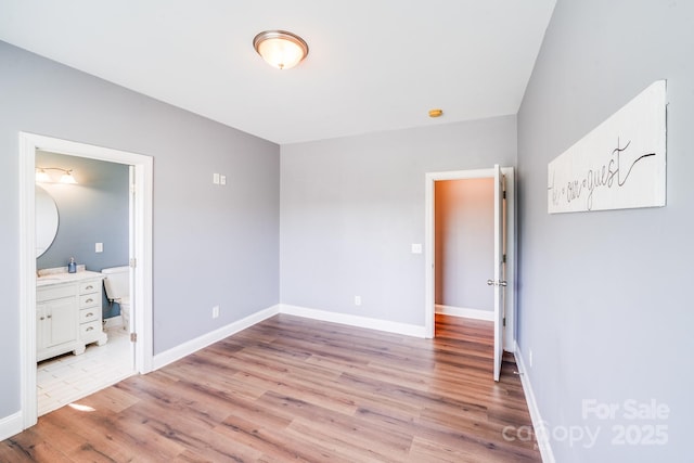 4525 Chestwood Ct, Rock Hill, SC 29732 - unfurnished bedroom featuring light wood-type flooring and connected bathroom