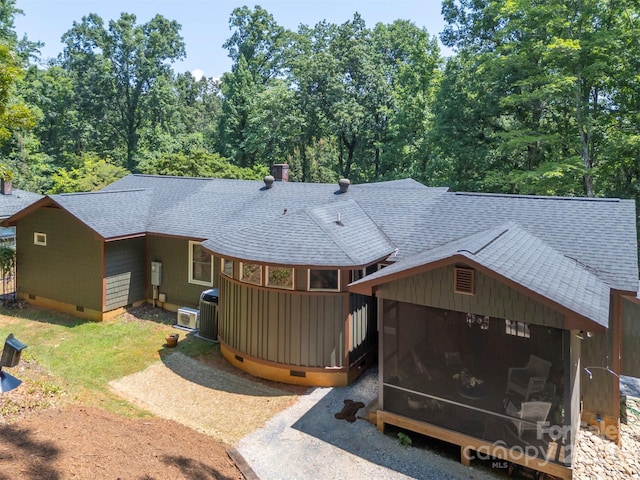 85 Red Bird Rd, Tryon, NC 28782 - rear view of house with a shingled roof, a sunroom, and a chimney