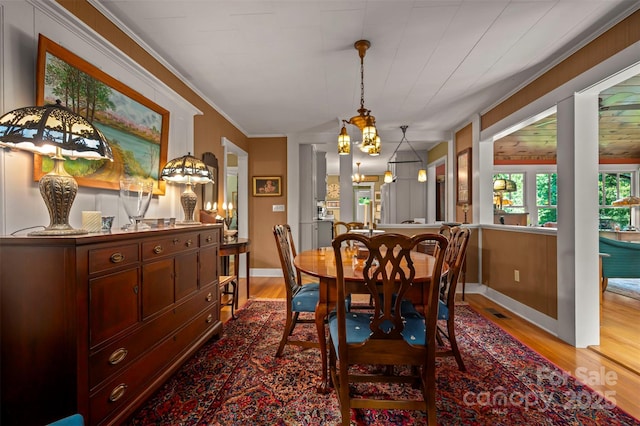 85 Red Bird Rd, Tryon, NC 28782 - dining room with light wood finished floors and crown molding