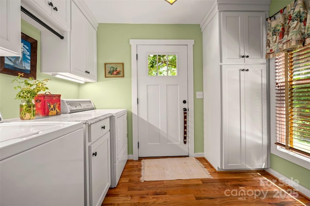 85 Red Bird Rd, Tryon, NC 28782 - washroom with washer and clothes dryer, wood finished floors, and cabinet space
