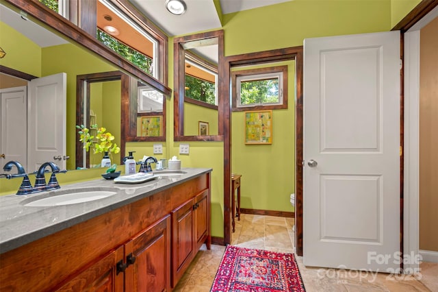 85 Red Bird Rd, Tryon, NC 28782 - full bath featuring double vanity and baseboards