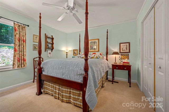 85 Red Bird Rd, Tryon, NC 28782 - carpeted bedroom featuring ornamental molding, a closet, and ceiling fan
